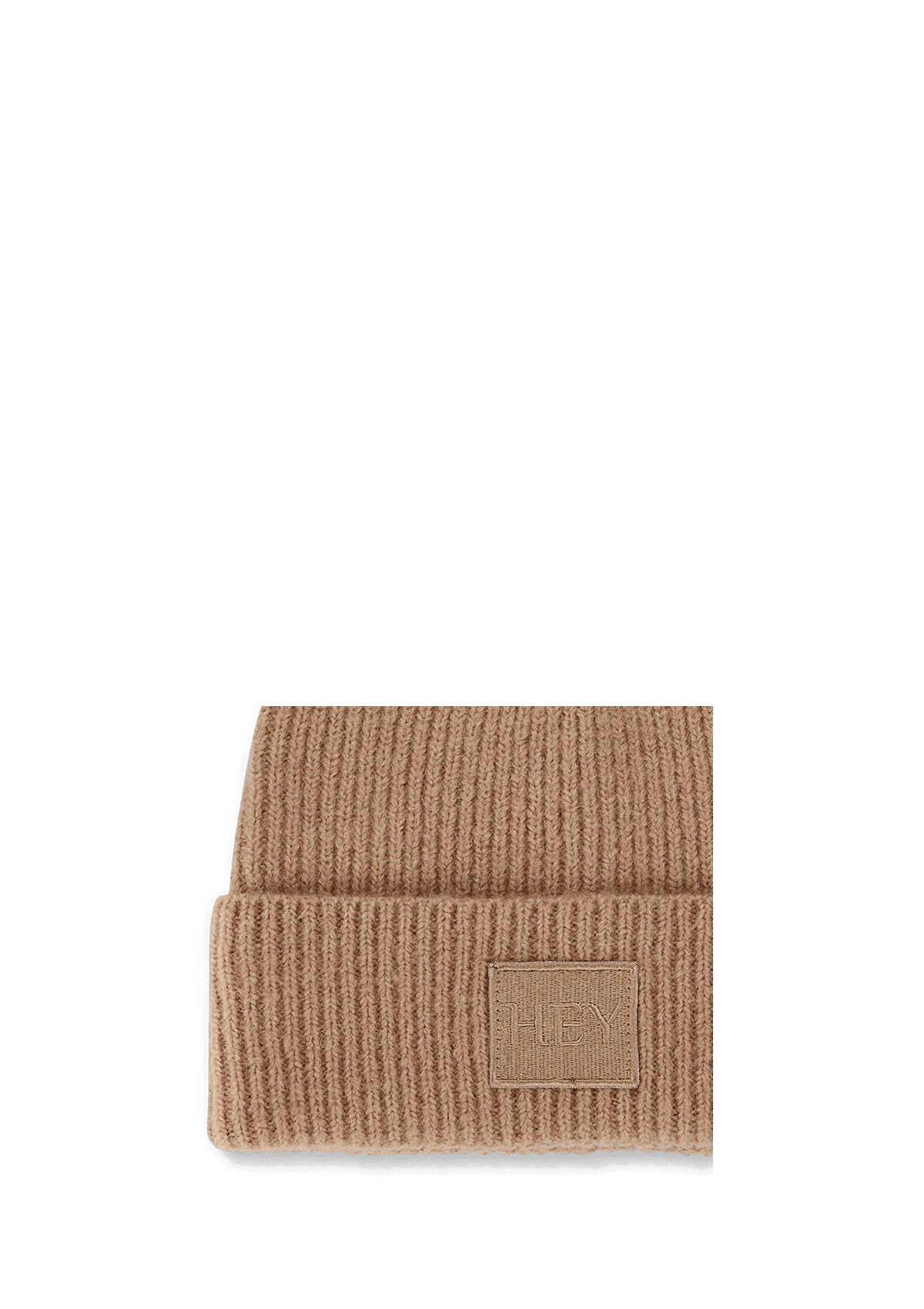 Produktabbildung auf neutralem Hintergrund des Produktes Hey Beanie in der Farbe Sand