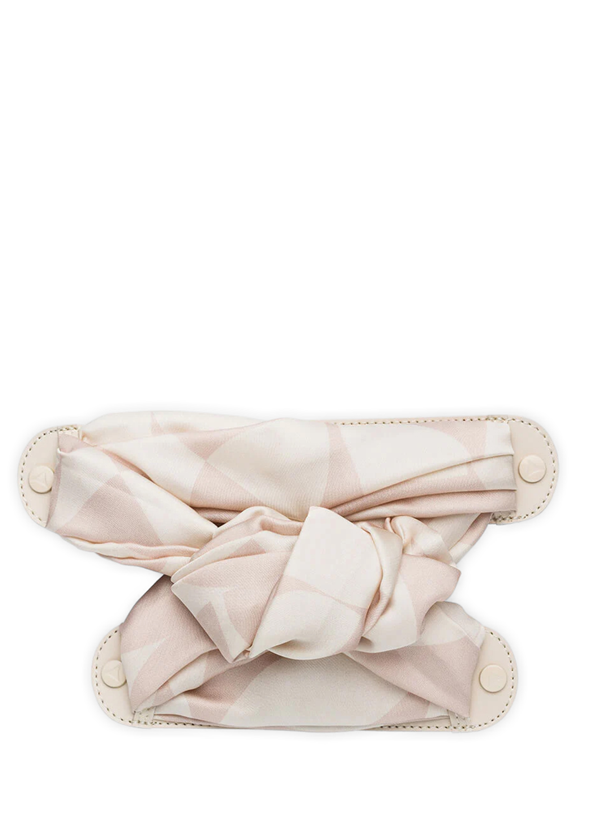 Frontalansicht auf neutralem Hintergrund des Produktes Silky Knot in der Farbe Crema